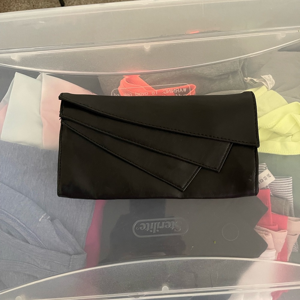 Simple, black clutch bag..